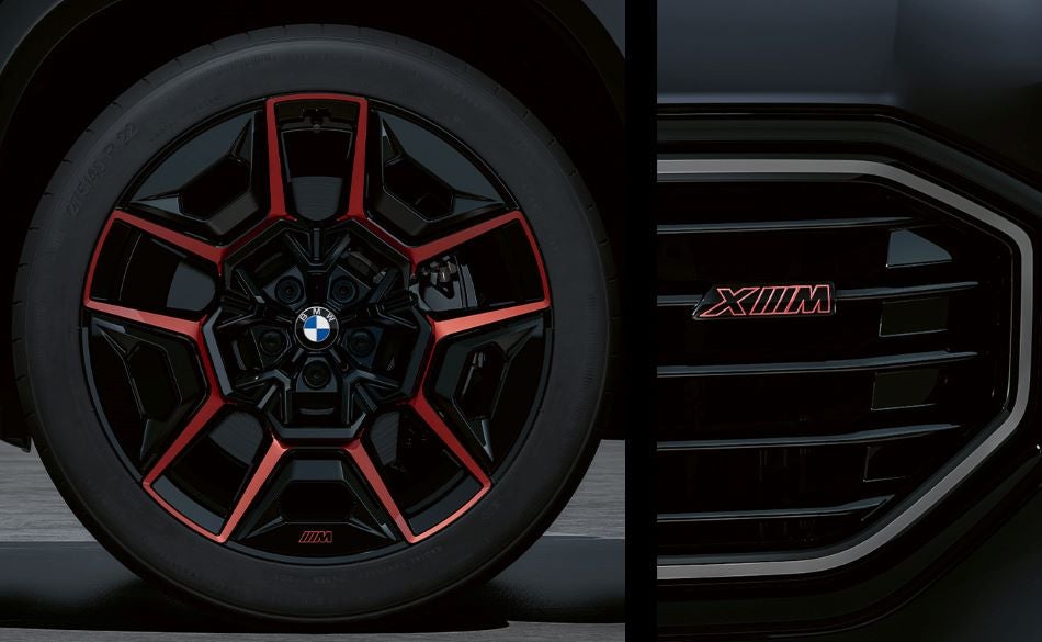 Detailed images of exclusive 22” M Wheels with red accents and XM badging on Illuminated Kidney Grille. in Ferman BMW | Palm Harbor FL