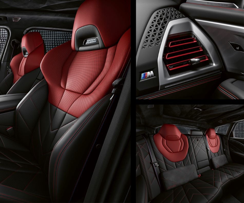 Detail of front seats, clad in exclusive BMW Individual Fiona Red & Black Merino Leather with exclusive M Signature Trim and red stitching and accents. Detail of red accented vent. Detail of rear M Lounge with exclusive XM pillows in Ferman BMW | Palm Harbor FL