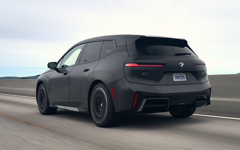 The BMW iX M70 driving rear shot. | Ferman BMW in Palm Harbor FL