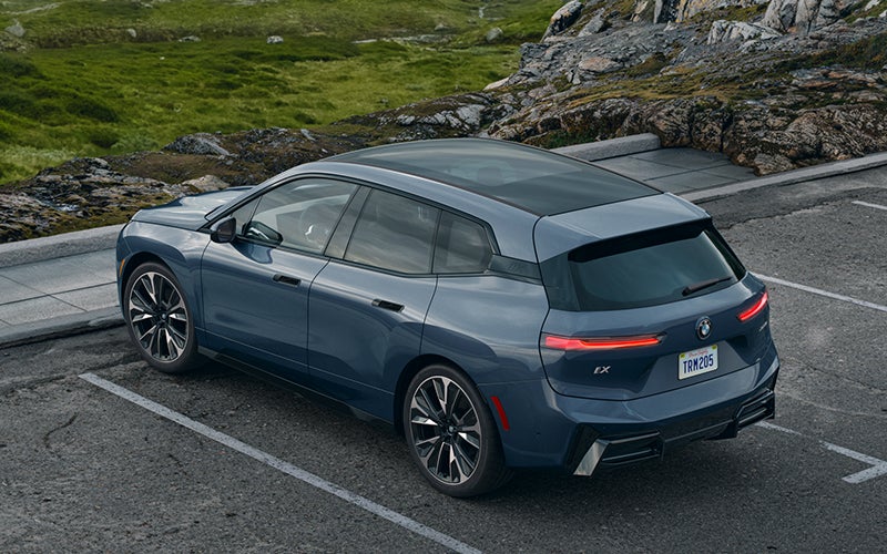 The BMW iX parked in a parking spot. | Ferman BMW in Palm Harbor FL